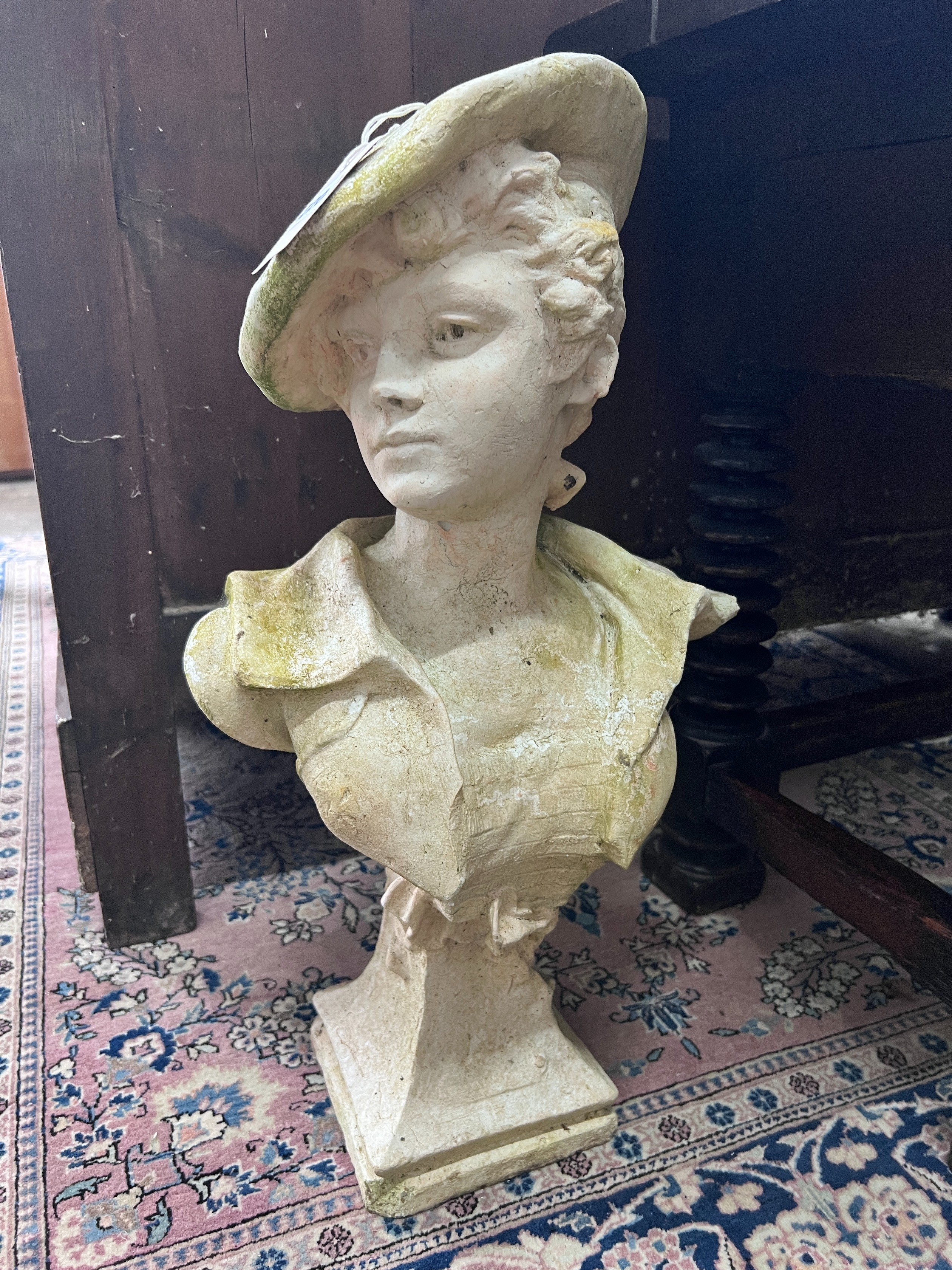A reconstituted stone bust of a 17th century youth, height 60cm *Please note the sale commences at 9am.